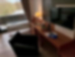 Der Fernseher mit Sitzgelegenheit auf unseren komfortablen Zimmern