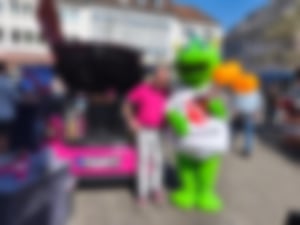 Flying Coffee mit dem Maskottchen der Stadt Worms, dem Wormel